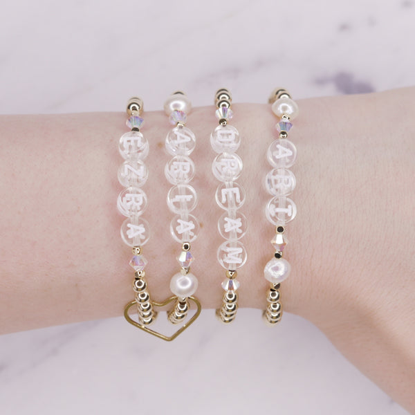 14k gold filled personalised bracelet with And Swarovski crystals pearls stretch bracelet on wrist