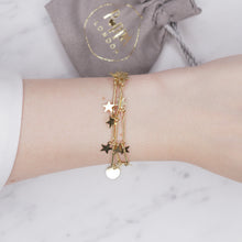 Load image into Gallery viewer, 24k gold plated starburst star chain bracelet 3 layers lobster clasp on wrist
