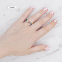 Load image into Gallery viewer, blue tones multicolour rainbow colourful eternity ring baguette slanted rectangle cubic zirconia micro pave crystal shiny ring blue tones on finger