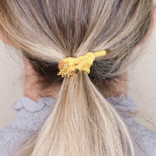 Load image into Gallery viewer, charm hair bands hair ties various colours enamel gold stars outline and filled with tag on jewellery yellow mustard on blonde long hair balayage highlights girl