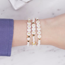 Load image into Gallery viewer, Cloud pink shimmer dream big evie personalised custom word phrase bracelets pearl 24K gold plated moon feature bead accent beads rondelle sparkling gold letter plastic beads on wrist blue shirt