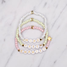 Load image into Gallery viewer, hope faith charity painted glass bead gold plated bracelets 24K matte gold crown pink green white shimmer gold rondelles elastic bracelets custom personalised word and phrases