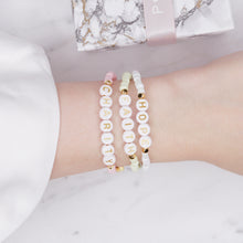 Load image into Gallery viewer, hope faith charity painted glass bead gold plated bracelets 24K matte gold crown pink green white shimmer gold rondelles elastic bracelets custom personalised word and phrases on wrist
