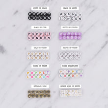 Load image into Gallery viewer, acrylic letter bead colours black white pink purple gold silver colour iridescent colour metallic gold cubic gold on marble