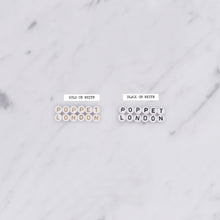 Load image into Gallery viewer, gold on white black on white plastic letters beads