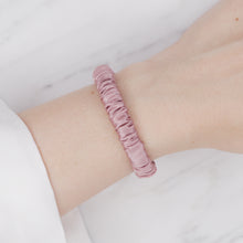 Load image into Gallery viewer, dusty rose pink mulberry silk soft hair tie hair band stretchy and kind to your hair on wrist
