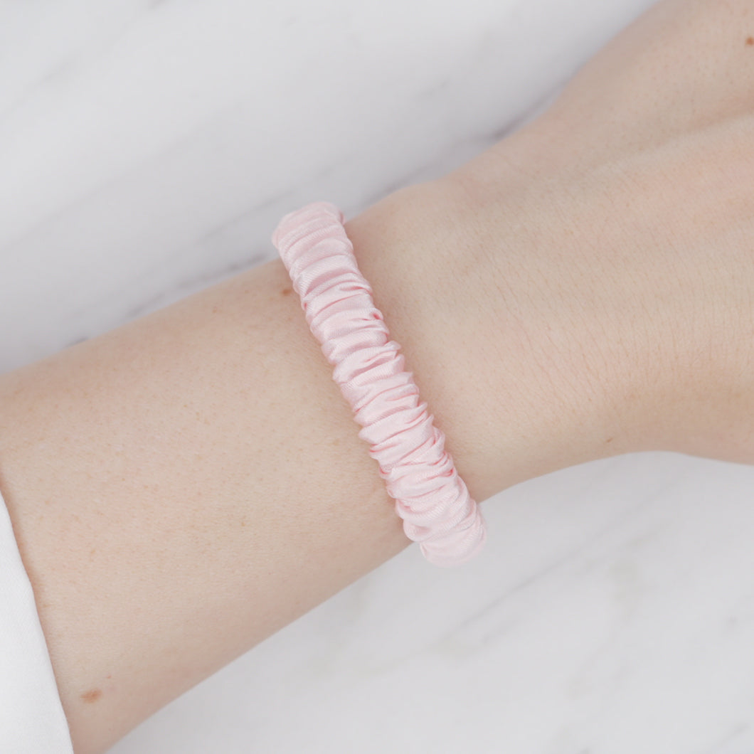 light baby pink mulberry silk soft hair tie hair band stretchy and kind to your hair on wrist
