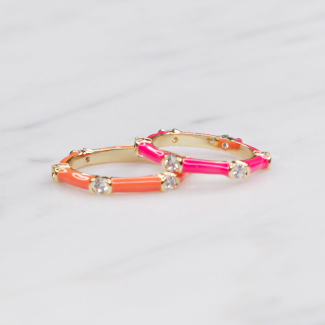 neon orange pink enamel cubic zirconia stacking rings thin bands gold great gifts for women on marble