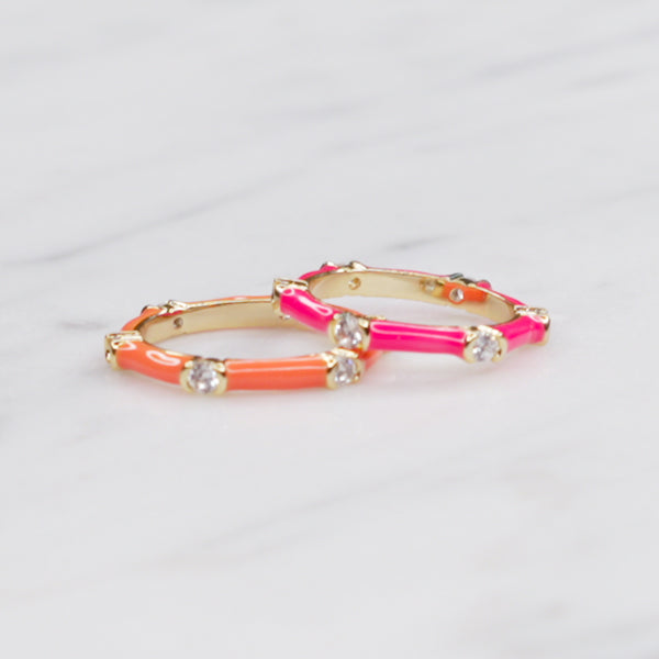 neon orange pink enamel cubic zirconia stacking rings thin bands gold great gifts for women on marble