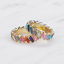 Load image into Gallery viewer, blue tones red tones multicolour rainbow colourful eternity ring baguette slanted rectangle cubic zirconia micro pave crystal shiny rings 2 on marble