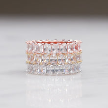 Load image into Gallery viewer, silver gold rose gold eternity ring baguette rectangle cubic zirconia micro pave crystal shiny rings three stacked on marble
