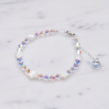 Load image into Gallery viewer, Swarovski Crystal AB XILION Crystal bicone And Mother Of Pearl Stars Bracelet silver on marble
