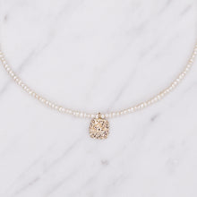 Load image into Gallery viewer, tiny freshwater 3mm pearls 18k gold plated angel pendant square necklace close up on wire on marble fine affordable jewellery gifts for women