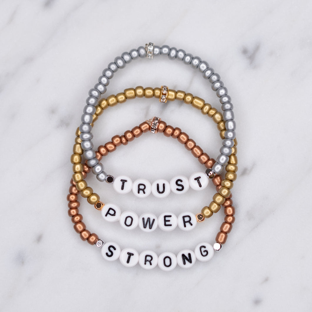 metallic rose gold silver antique gold stretchy elastic painted beaded bracelet sparkling rondelle trust power strong affirmation bracelets 24k gold plated silver plated on marble