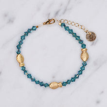 Load image into Gallery viewer, turquoise marine Swarovski crystal 24k matte gold plated 3 trio fish bracelet 4mm crystals wire on marble fine affordable jewellery gifts for women