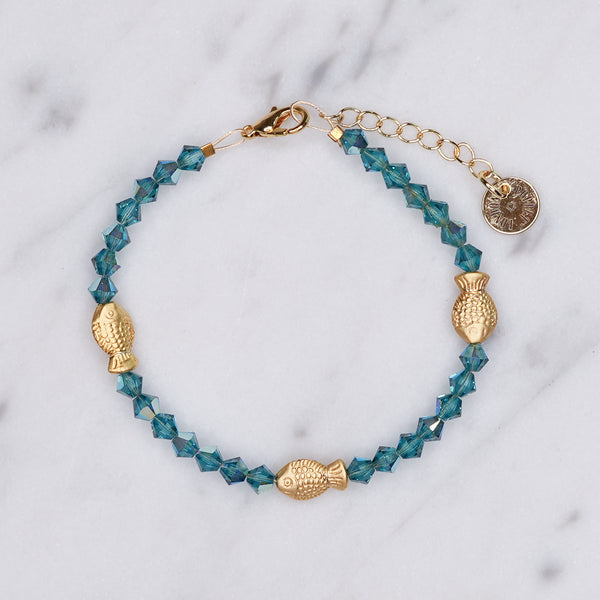 turquoise marine Swarovski crystal 24k matte gold plated 3 trio fish bracelet 4mm crystals wire on marble fine affordable jewellery gifts for women