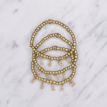 Load image into Gallery viewer, antique gold painted beaded elastic stretchy bracelet 24k gold plated micro pave zirconia letter initial charm words personalised rondelle bead on marble