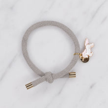Load image into Gallery viewer, charm hair bands hair ties various colours enamel pink white unicorn with tag on jewellery grey on marble
