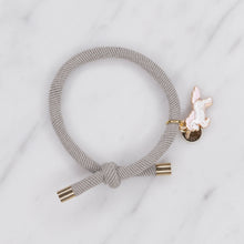 Load image into Gallery viewer, charm hair bands hair ties various colours enamel pink white unicorn with tag on jewellery grey on marble