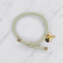 Load image into Gallery viewer, charm hair bands hair ties various colours gold bee with tag on jewellery light mint green on marble