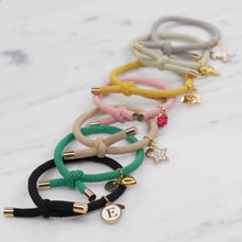 Load image into Gallery viewer, charm hair bands hair ties various colours unicorn star bee strawberry heart pink tan light green yellow mustard black grey on marble
