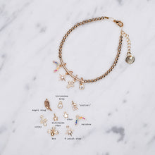 Load image into Gallery viewer, 14k gold filled beaded micro charm bar bracelet bracelet on wire chain with jewellery tag rainbow cubic zirconia 8 point star outline cross zirconia droplet drop dangling loose 24K labelled charm choice bee angel wing initial micro pave
