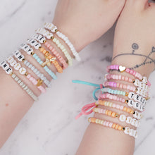 Load image into Gallery viewer, named word custom personalised elastic bracelets colourful multi colour charm bracelets bows tassels great affordable fine jewellery gifts for women birthday christmas heart bead pink green orange blue grey brown
