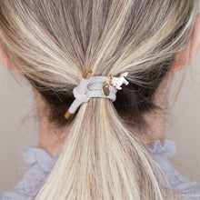 Load image into Gallery viewer, charm hair bands hair ties various colours enamel pink white unicorn with tag on jewellery grey on blonde long hair balayage highlights girl
