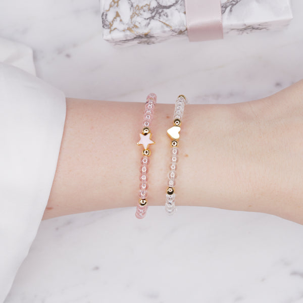 pink tinted and clear iridescent glass beaded bracelets 24K gold plated heart bead star pink enamel bead gold crystal rondelles on wrist