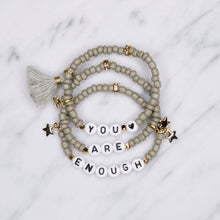 Load image into Gallery viewer, 24k gold plated khaki mud grey tassel star rondelle gold charm black heart letters &#39;you are enough&#39; affirmation stack bracelets stretch elastic painted beads
