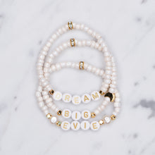 Load image into Gallery viewer, Cloud pink shimmer dream big evie personalised custom word phrase bracelets pearl 24K gold plated moon feature bead accent beads rondelle sparkling gold letter plastic beads on marble
