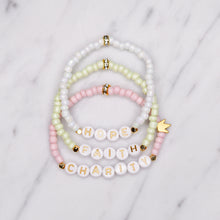 Load image into Gallery viewer, hope faith charity painted glass bead gold plated bracelets 24K matte gold crown pink green white shimmer gold rondelles elastic bracelets custom personalised word and phrases
