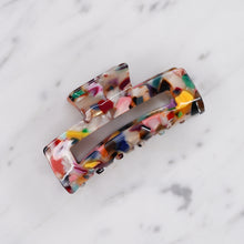 Load image into Gallery viewer, large multicoloured tortoise shell confetti resin pattern hair barrette claw clip on marble angle 2
