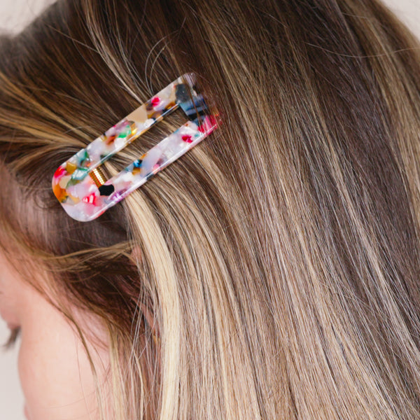 multi coloured pink orange green blue tortoise shell resin confetti pattern hair barrette clips 3 different shapes hair slides in blonde girl ombre balayage hair