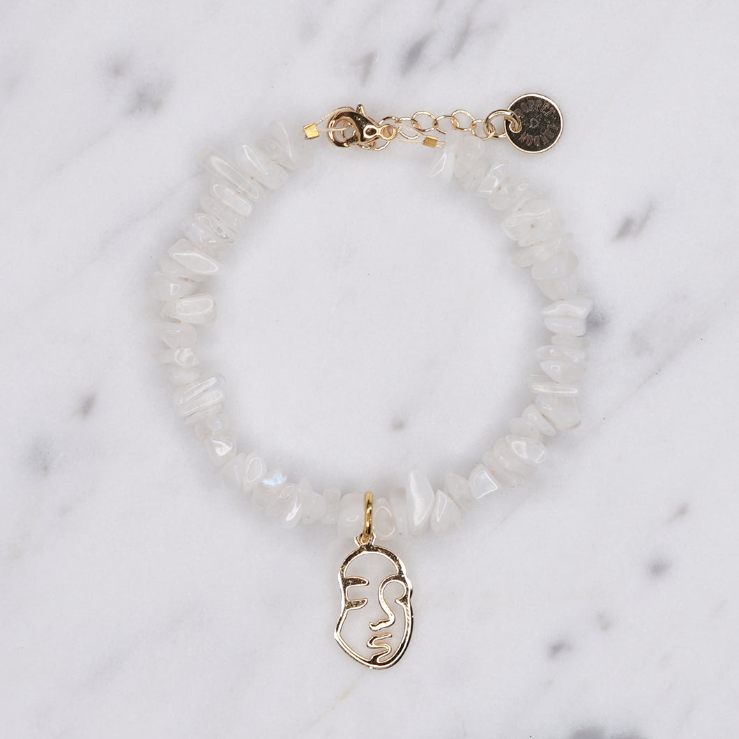 natural rainbow moonstone precious stone with healing properties bracelet fasten chain lobster clap face visage charm 24k gold plated jewellery gifts for women presents on marble