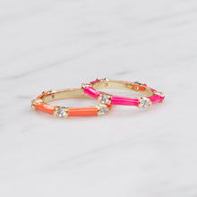 Load image into Gallery viewer, neon orange pink enamel cubic zirconia stacking rings thin bands gold great gifts for women on marble
