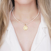 Load image into Gallery viewer, button pearls and matte gold plated greek pendant head double sided coin necklace wire lobster clasp on blonde girl neck
