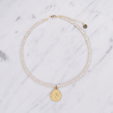 Load image into Gallery viewer, button pearls and matte gold plated greek pendant head double sided coin necklace wire lobster clasp on marble
