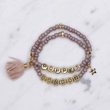 Load image into Gallery viewer, purple mink mauve painted beaded stretch elastic bracelets 24k gold plated tassel gold metallic letters custom word stars charm

