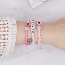 Load image into Gallery viewer, breast cancer awareness bracelets pink ribbon bright pink light pink rondelle sparkle painted glass bead elastic bracelets stretchy brave breast cancer survivor opal resin silver plated acrylic beads on wrist
