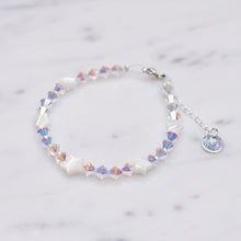 Load image into Gallery viewer, Swarovski Crystal AB XILION Crystal bicone And Mother Of Pearl Stars Bracelet silver on marble
