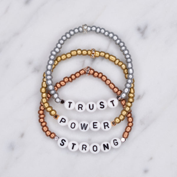 metallic rose gold silver antique gold stretchy elastic painted beaded bracelet sparkling rondelle trust power strong affirmation bracelets 24k gold plated silver plated on marble