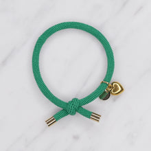 Load image into Gallery viewer, charm hair bands hair ties various colours gold heart with tag on jewellery green on marble
