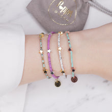 Load image into Gallery viewer, clay coloured beaded afghan bead bracelets purple aqua pink brown delicate 3 stars 24k gold plated silver plated rose gold plated wire bracelets on wrist
